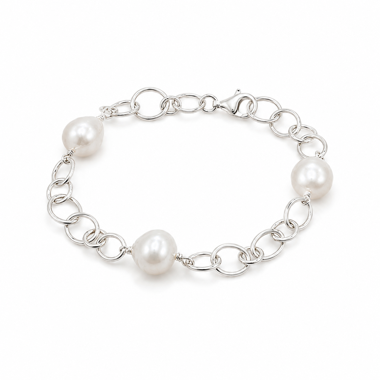 Australian South Sea pearl bracelet featuring three lustrous white pearls on a polished 925 sterling silver link chain